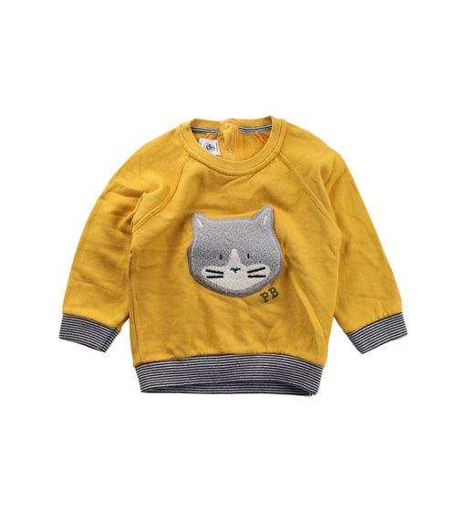 A Yellow Crewneck Sweatshirts from Petit Bateau in size 2T for girl. (Front View)