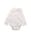 A White Long Sleeve Bodysuits from Jacadi in size 2T for girl. (Front View)