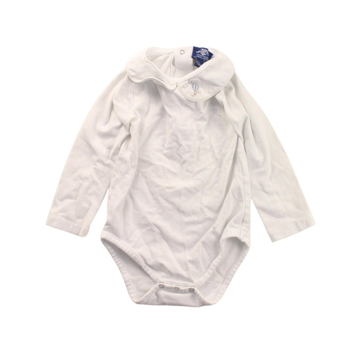 A White Long Sleeve Bodysuits from Thomas Brown in size 12-18M for girl. (Front View)