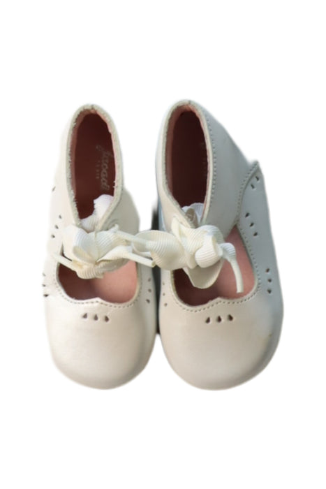 A White Flats from Jacadi in size 12-18M for girl. (Back View)