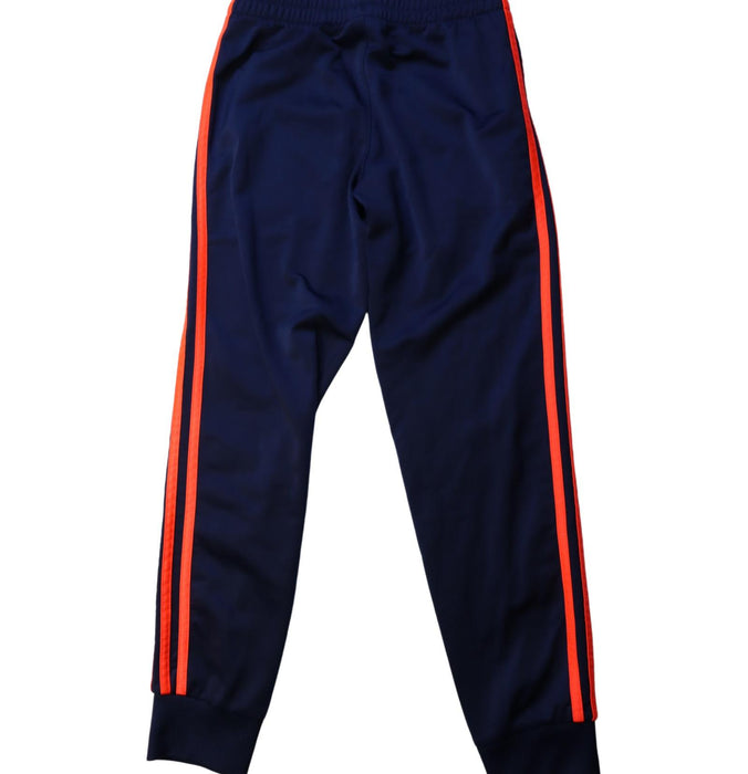 A Orange Sweatpants from Adidas in size 8Y for boy. (Back View)