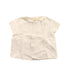 A White Short Sleeve Shirts from Nanos in size 12-18M for girl. (Front View)
