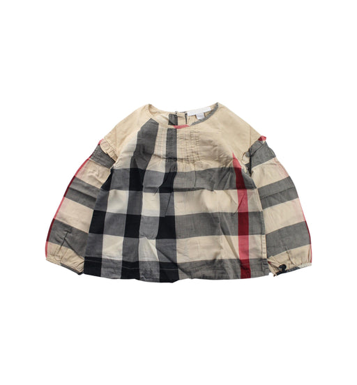 A Beige Long Sleeve Tops from Burberry in size 4T for girl. (Front View)