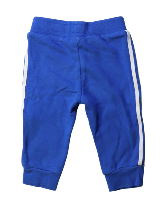 A Blue Sweatpants from Adidas in size 6-12M for boy. (Back View)