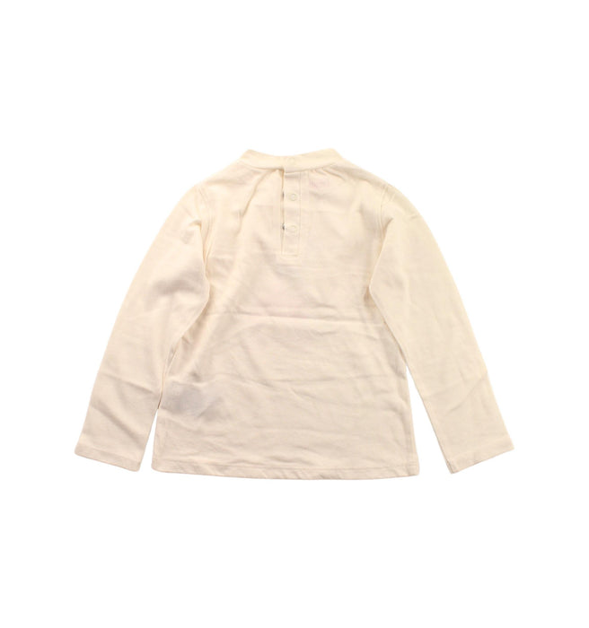 A White Long Sleeve T Shirts from La Compagnie des Petits in size 4T for girl. (Back View)