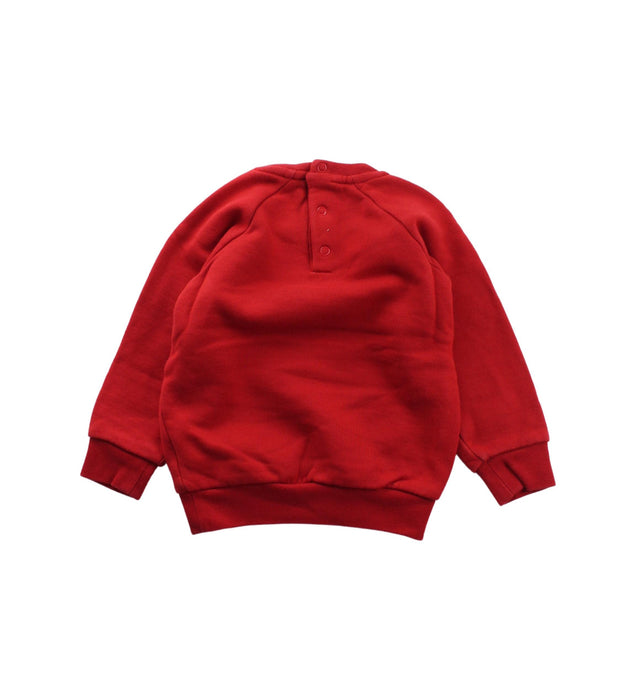 A Red Crewneck Sweatshirts from Petit Bateau in size 2T for boy. (Back View)