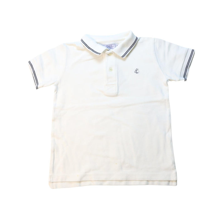 A Black Short Sleeve Polos from Petit Bateau in size 6T for boy. (Front View)