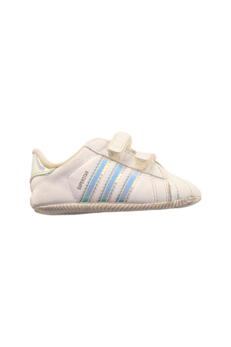 A White Sneakers from Adidas in size 12-18M for boy. (Front View)