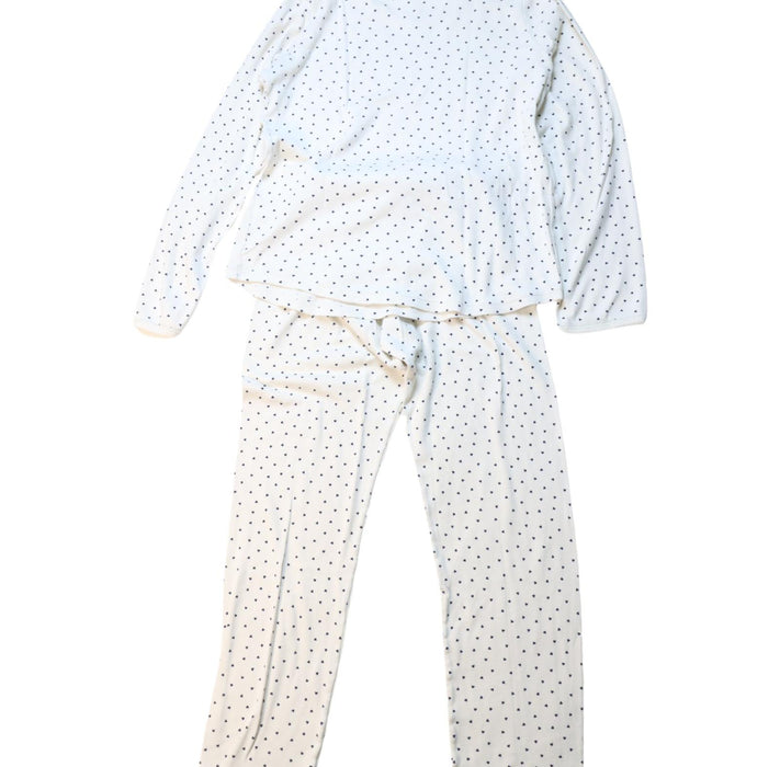 A White Pyjama Sets from Petit Bateau in size 10Y for girl. (Back View)