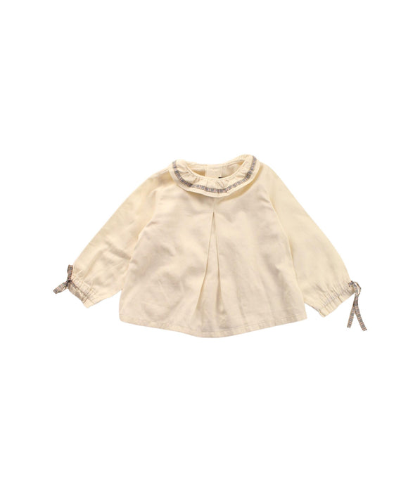 A White Long Sleeve Tops from Burberry in size 3-6M for girl. (Front View)