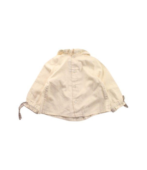 A White Long Sleeve Tops from Burberry in size 3-6M for girl. (Back View)