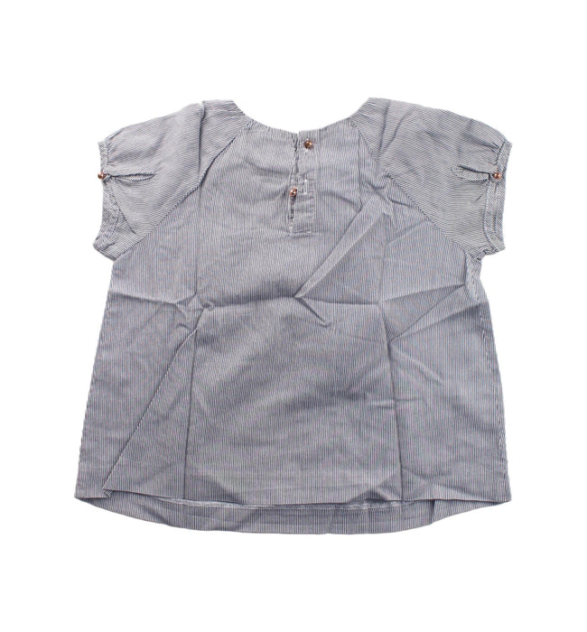 A Blue Short Sleeve Tops from Jacadi in size 4T for girl. (Back View)