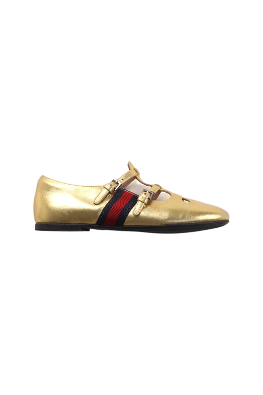 A Gold Flats from Gucci in size 5T for girl. (Front View)