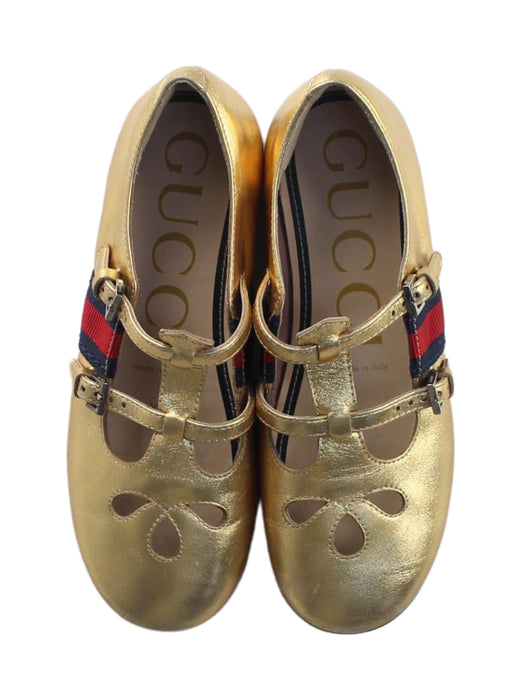 A Gold Flats from Gucci in size 5T for girl. (Back View)