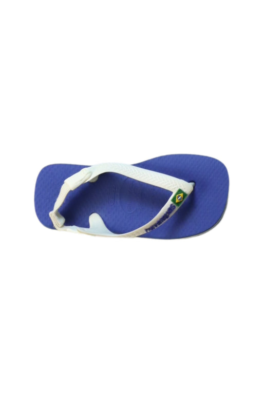A White Flip Flops from Havaianas in size 4T for girl. (Front View)