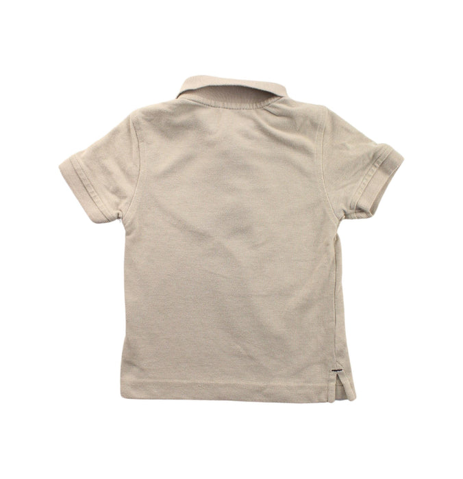 A Beige Short Sleeve Polos from Nautica in size 2T for boy. (Back View)