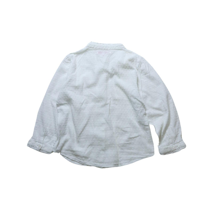 A White Long Sleeve Shirts from La Petite Caravane in size 4T for girl. (Back View)