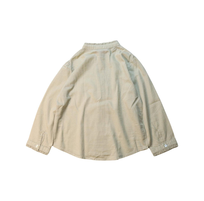A Beige Long Sleeve Shirts from La Petite Caravane in size 4T for girl. (Back View)