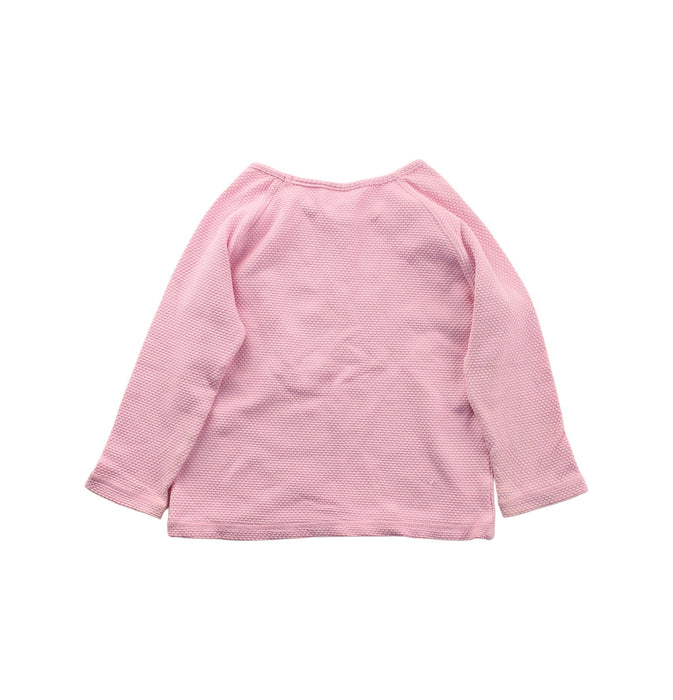A Pink Long Sleeve Tops from Seed in size 2T for girl. (Back View)