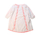 A Peach Long Sleeve Dresses from Boden in size 5T for girl. (Front View)