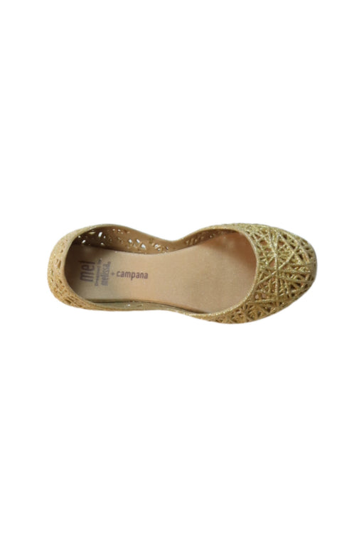 A Gold Flats from Mini Melissa in size 6T for girl. (Front View)