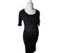A Black Long Sleeve Dresses from Isabella Oliver in size S for maternity. (Front View)