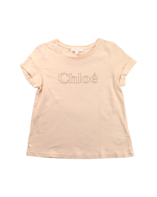 A Beige Short Sleeve T Shirts from Chloe in size 6T for girl. (Front View)