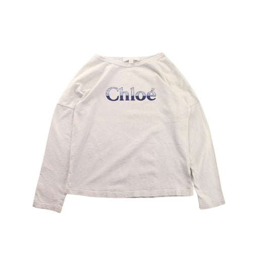 A White Long Sleeve T Shirts from Chloe in size 6T for neutral. (Front View)