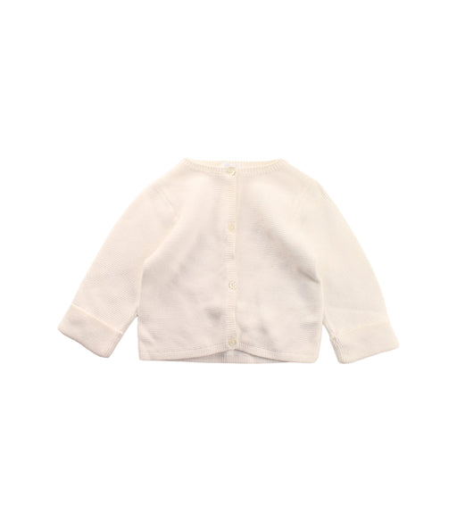 A White Cardigans from Jacadi in size 3-6M for girl. (Front View)