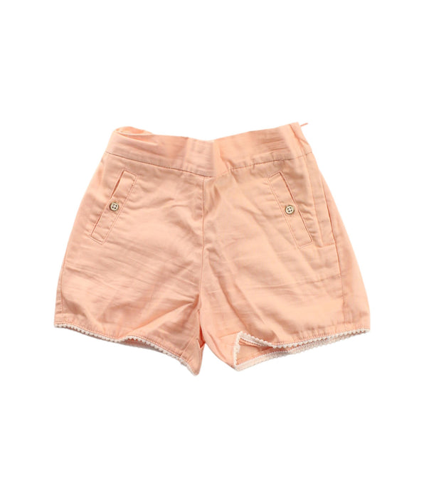 A Peach Shorts from Janie & Jack in size 6T for girl. (Front View)