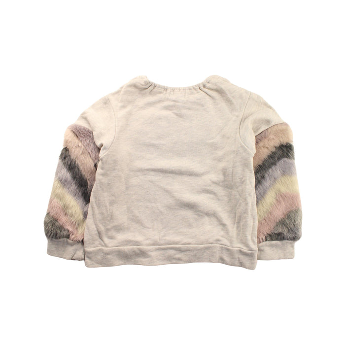 A Beige Crewneck Sweatshirts from Anna Sui in size 5T for girl. (Back View)