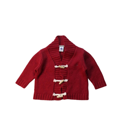 A Red Cardigans from Petit Bateau in size 6-12M for girl. (Front View)
