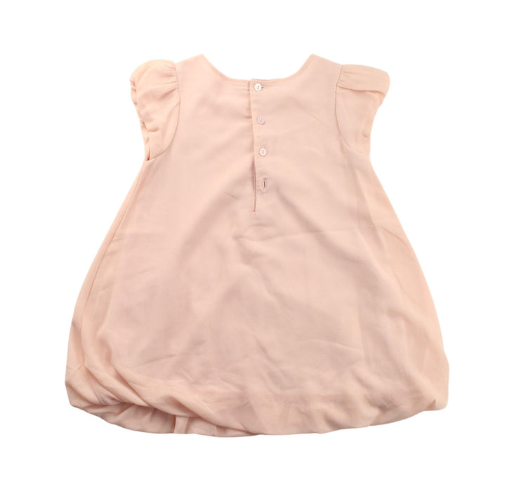 A Peach Short Sleeve Dresses from Kingkow in size 4T for girl. (Back View)