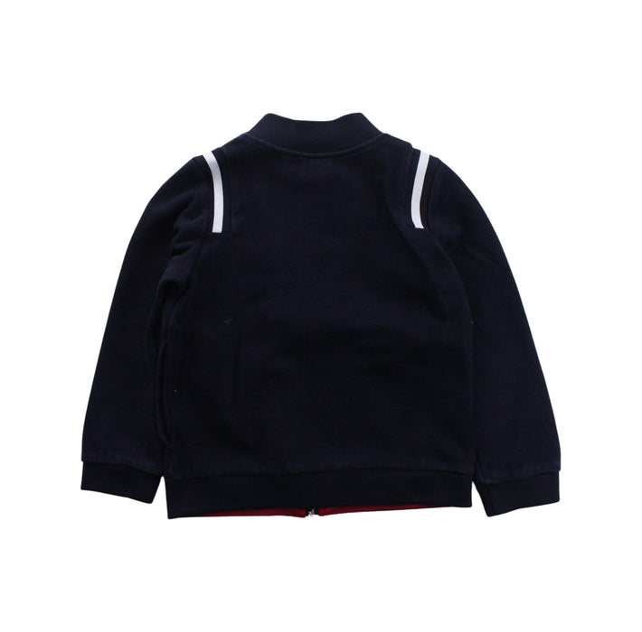 A Navy Zippered Sweatshirts from Jacadi in size 6T for boy. (Back View)