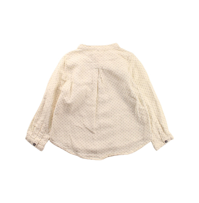A White Long Sleeve Tops from Nanos in size 4T for girl. (Back View)