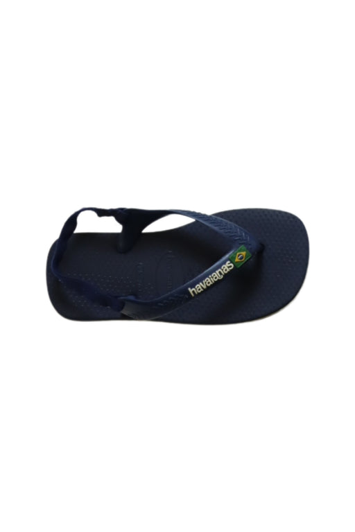 A Navy Flip Flops from Havaianas in size 4T for girl. (Front View)