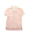 A Pink Short Sleeve Polos from Nicholas & Bears in size 6T for girl. (Front View)