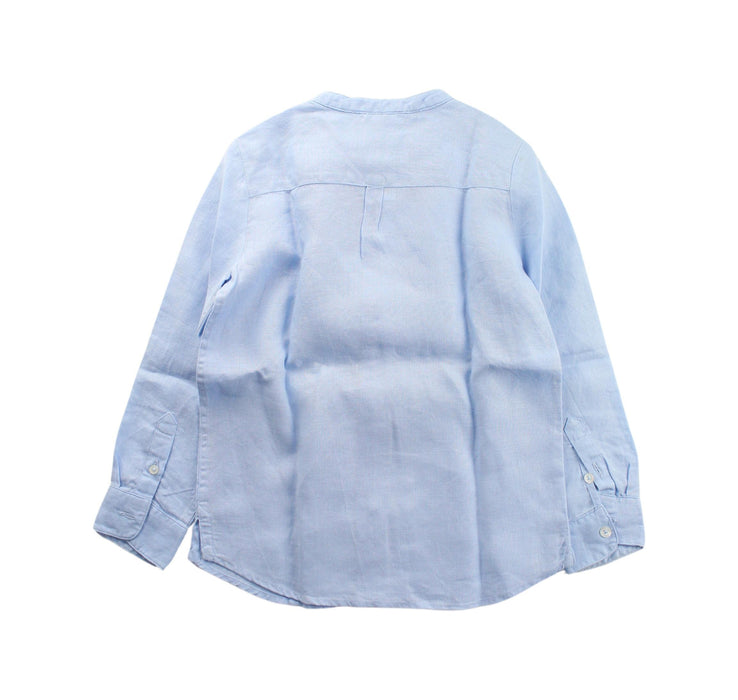 A Blue Long Sleeve Shirts from Jacadi in size 6T for boy. (Back View)