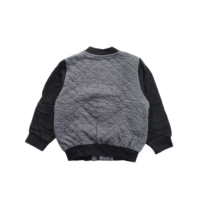 A Black Puffer/Quilted Jackets from Petit Bateau in size 4T for neutral. (Back View)