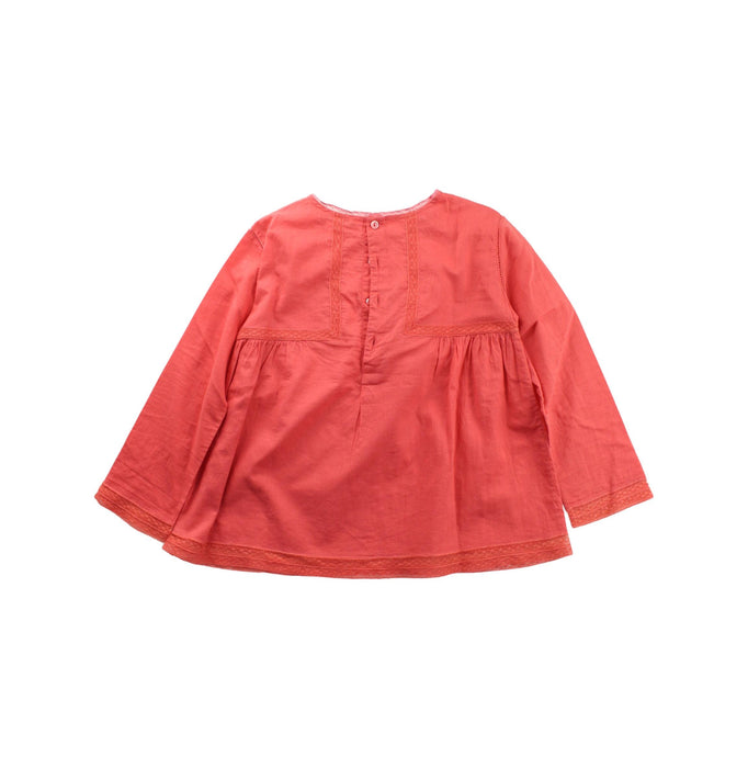 A Orange Long Sleeve Tops from Bonpoint in size 4T for girl. (Back View)
