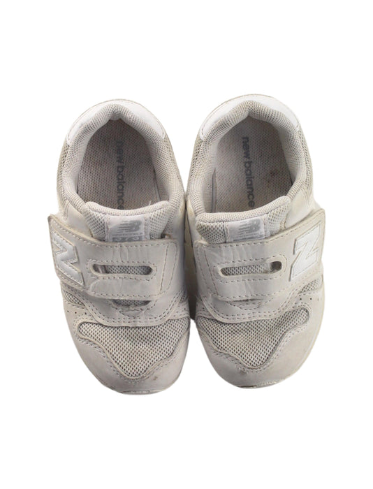 A White Sneakers from New Balance in size 18-24M for boy. (Back View)