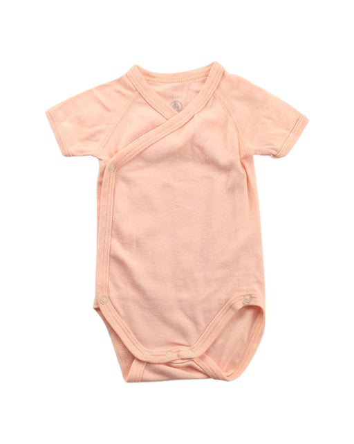 A Peach Short Sleeve Bodysuits from Petit Bateau in size 0-3M for girl. (Front View)