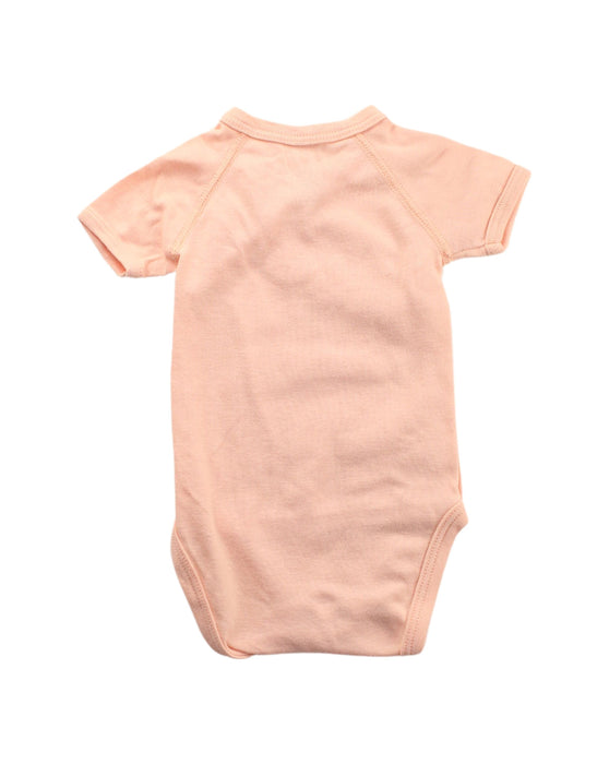 A Peach Short Sleeve Bodysuits from Petit Bateau in size 0-3M for girl. (Back View)