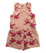 A Peach Sleeveless Rompers from Mini Rodini in size 5T for girl. (Front View)