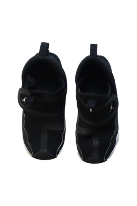 A Black Slip Ons from Air Jordan in size 4T for boy. (Back View)
