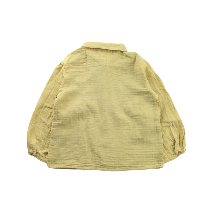 A Yellow Long Sleeve Shirts from Nanos in size 3T for boy. (Back View)