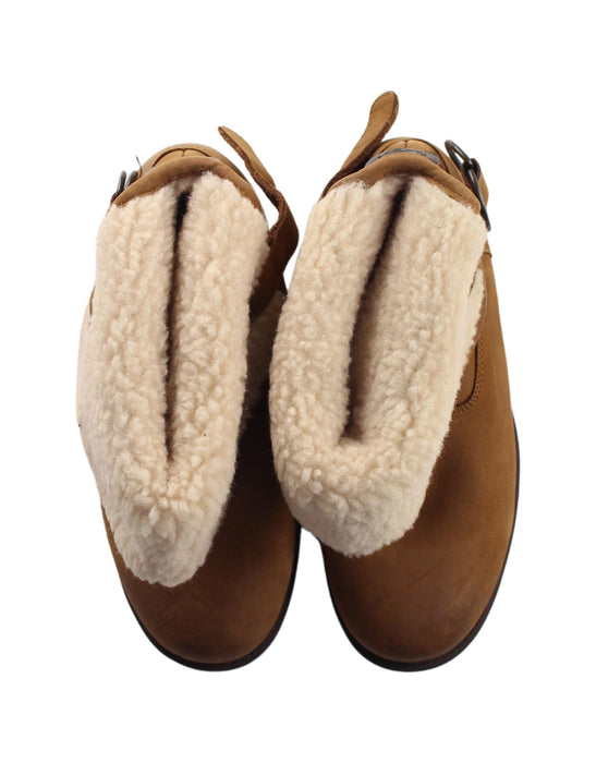 A Brown Winter Boots from UGG in size 11Y for girl. (Back View)