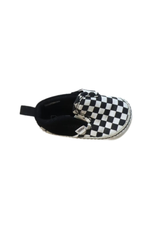 A Black Slip Ons from Vans in size 6-12M for boy. (Front View)
