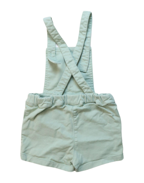 A Green Overall Shorts from Nanos in size 12-18M for neutral. (Back View)