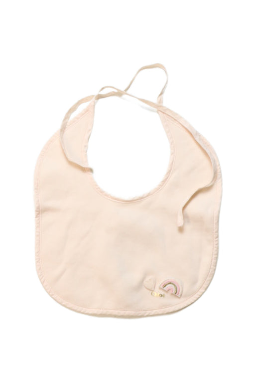 A Peach Bibs from Chloe in size O/S for neutral. (Front View)